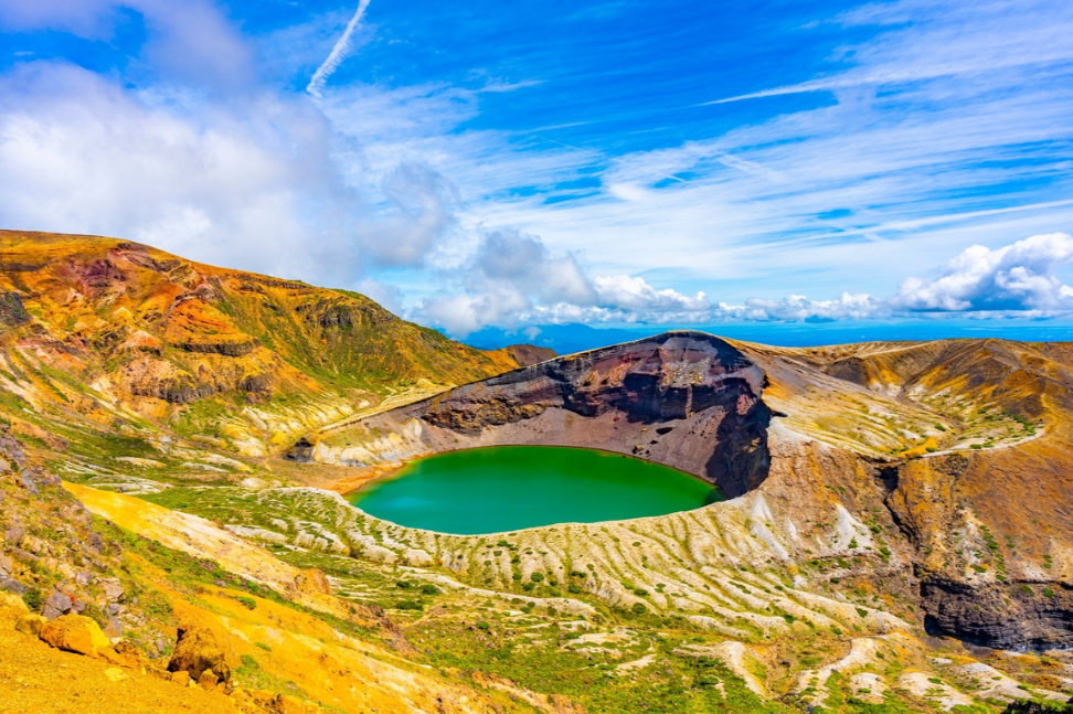 The emerald-green water of Okama crater lake at Zao