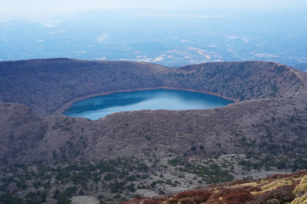 Karakunidake peak and surrounding volcanic landscape