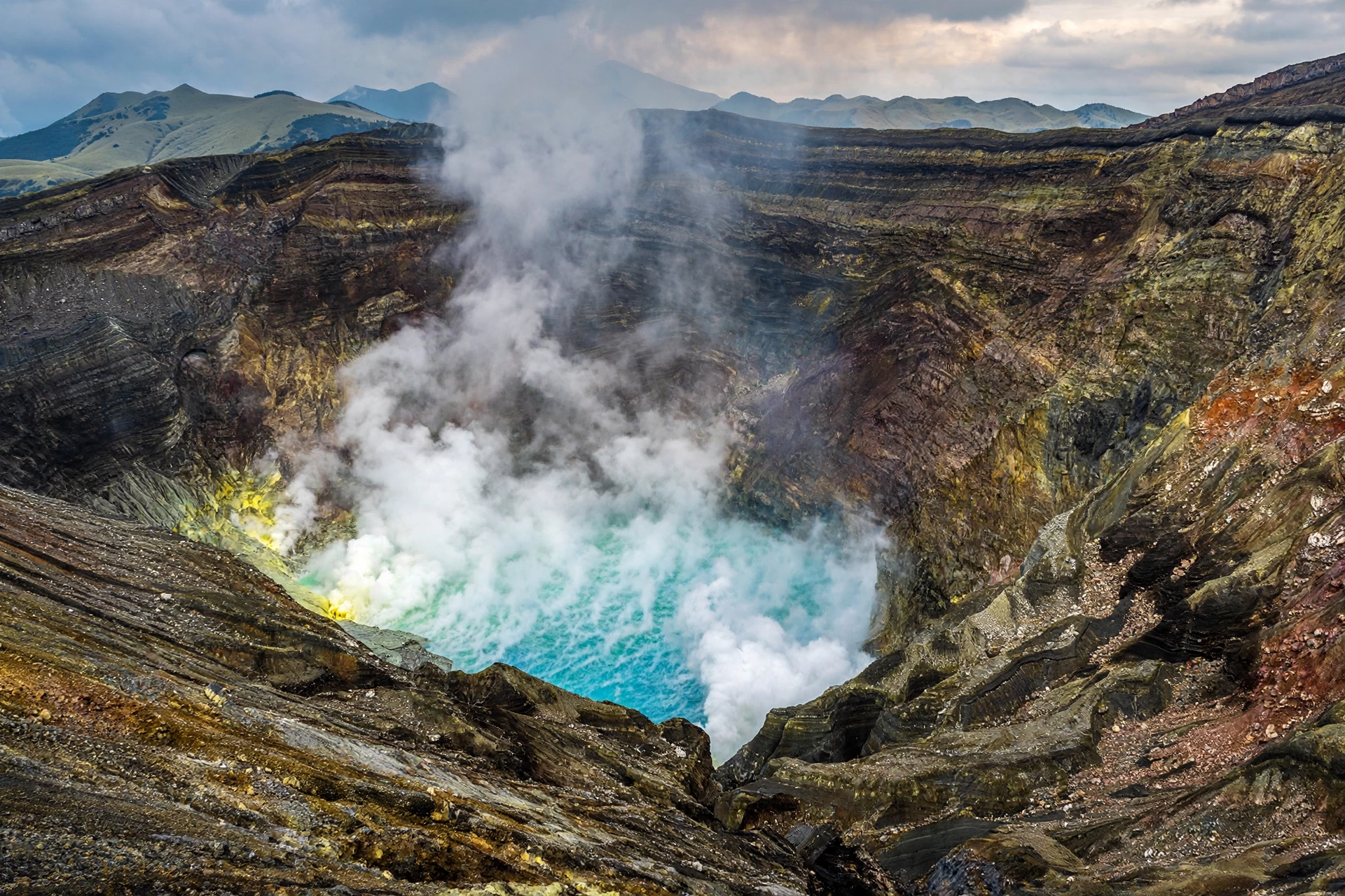 Nakadake crater with volcanic lake at Mount Aso, Kyushu, Japan