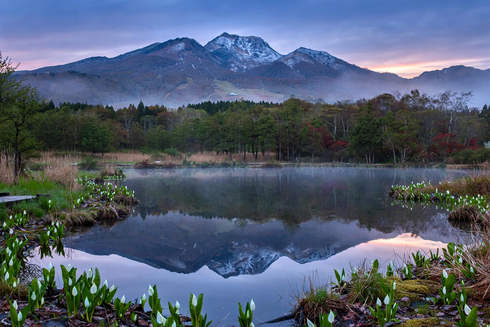 Mirror reflection of Mount Myoko in Imori Pond, Niigata, Japan