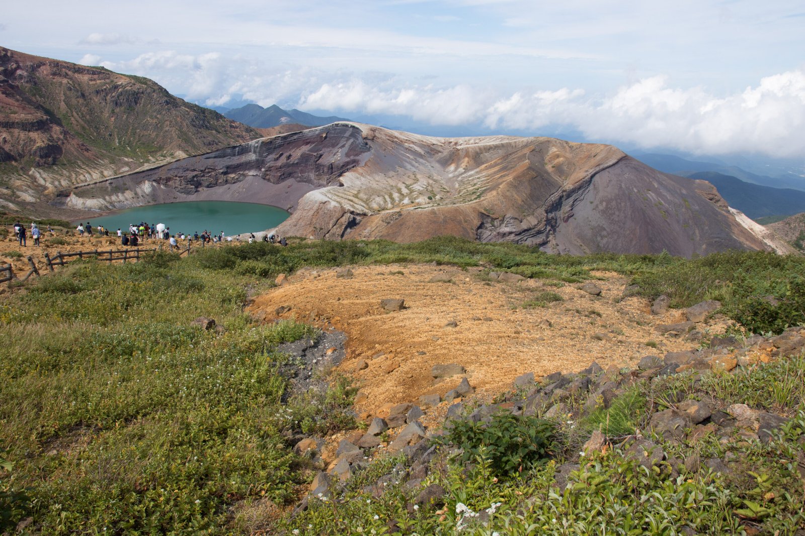 The green crater lake Okama in the Zao Mountains, Miyagi